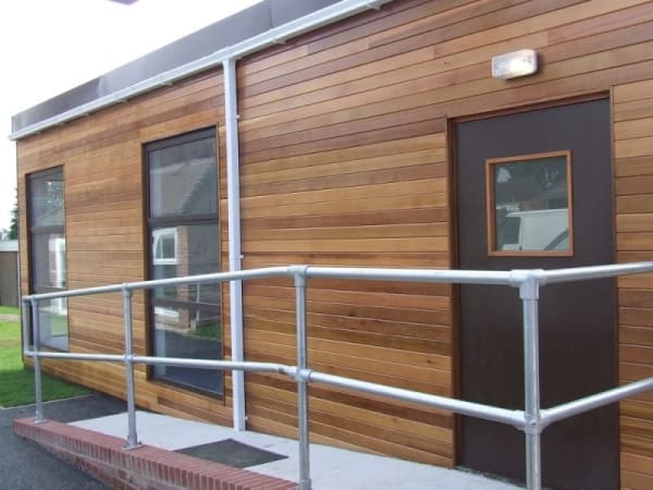 exterior of mobile classroom with handrail