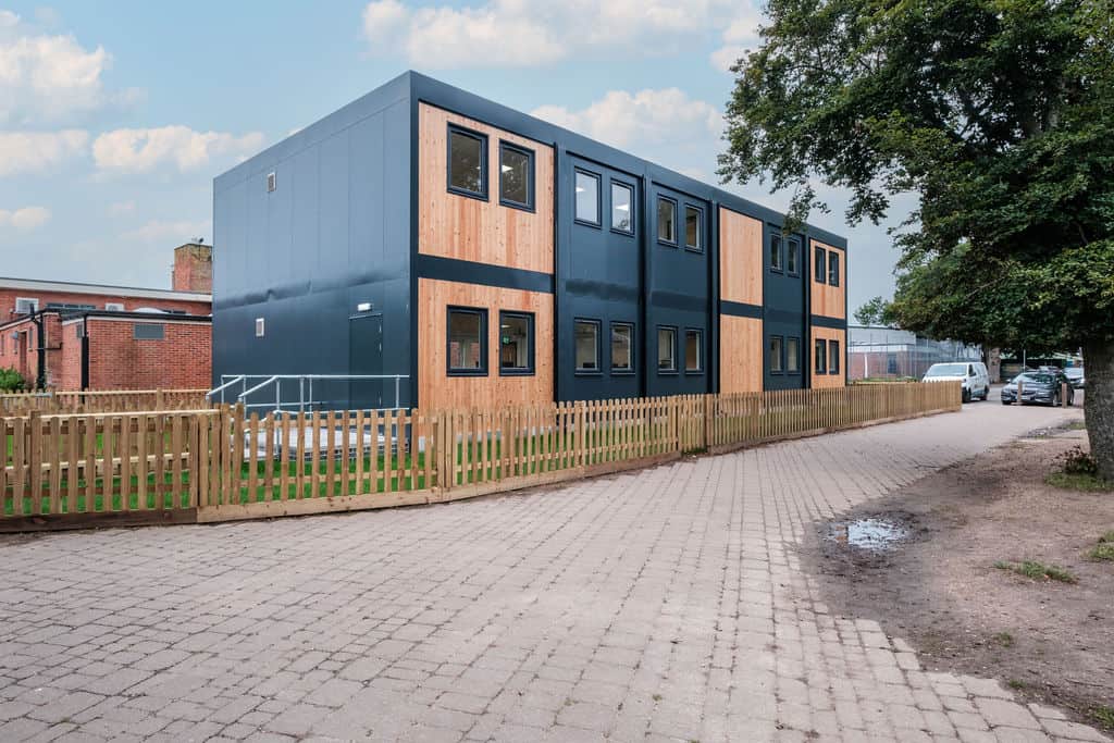 Priestlands School used modular building. 2 storey refurbished modular building with timber cladding